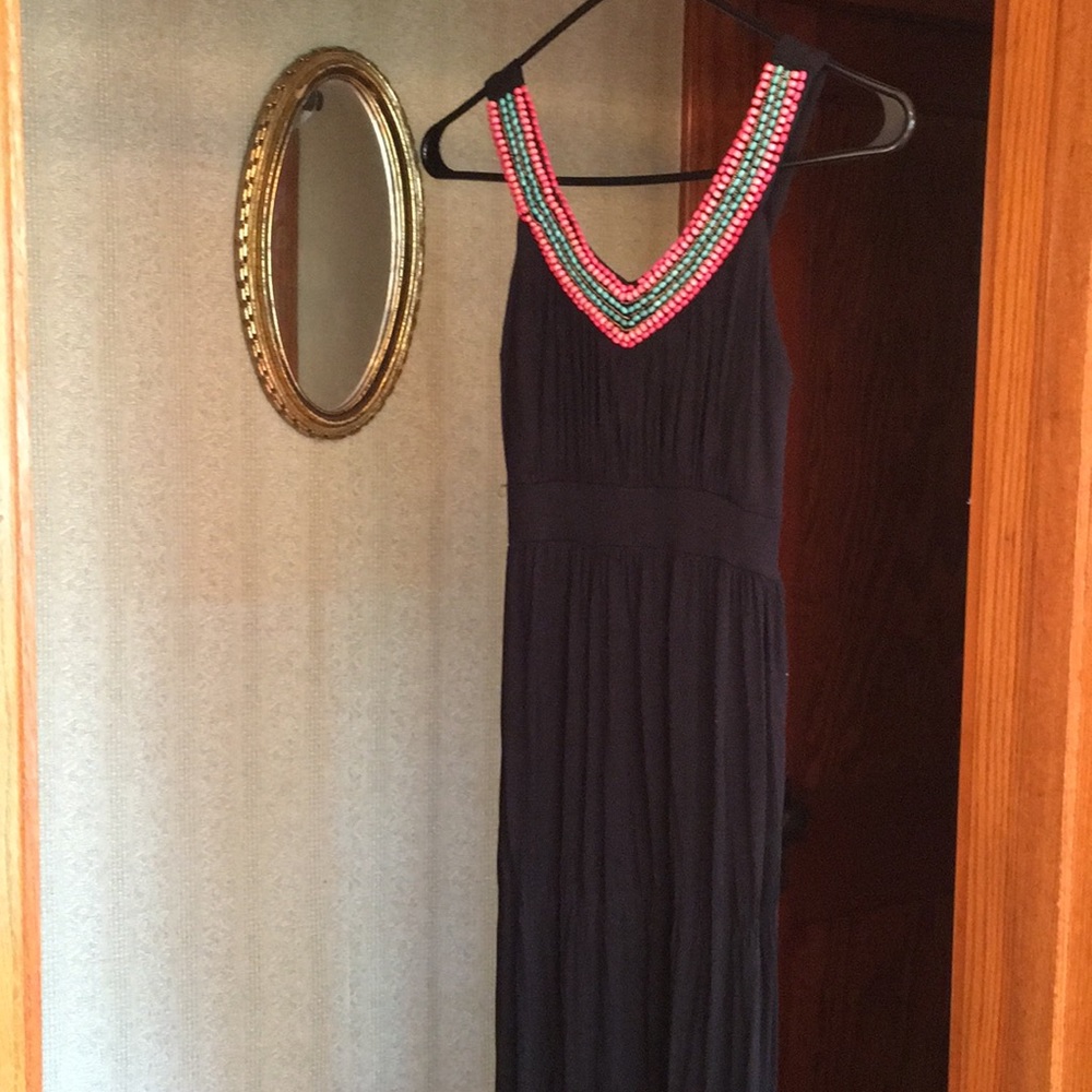 Black maxi dress with beaded neckline