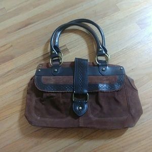 Medium sized brown leather handbag