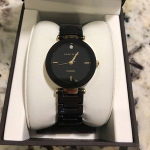 Anne Klein black & gold watch