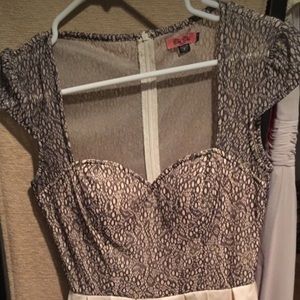 Black lace and beige knee length cocktail dress