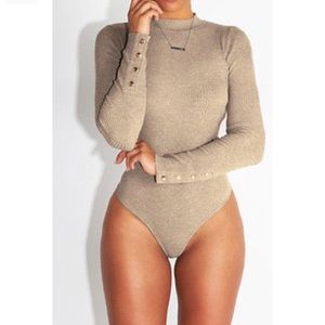 Button Sleeved leotards. Tan SOLD black for sale !