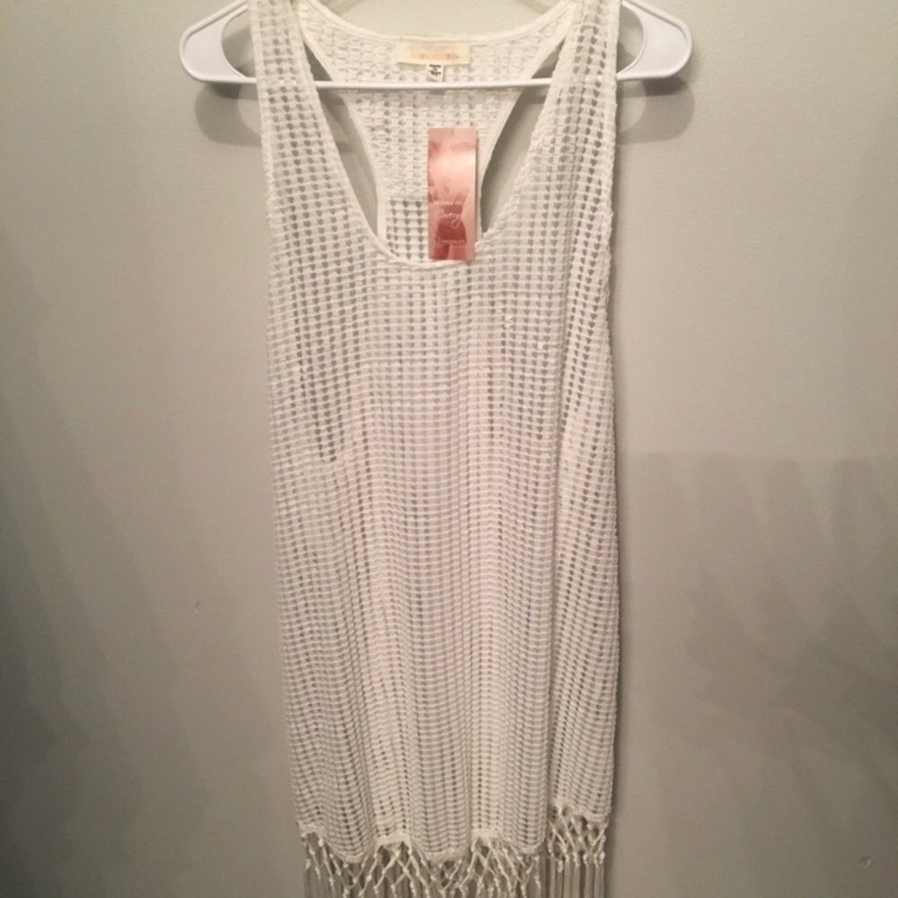 Francesca’s white cover up.