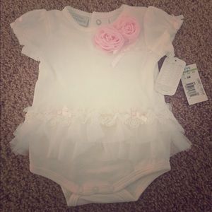 Cream onesie with ruffles