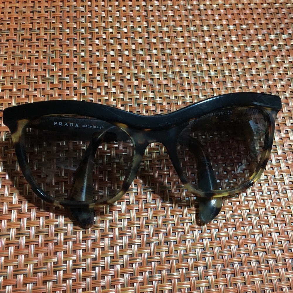 Prada Sunglasses.