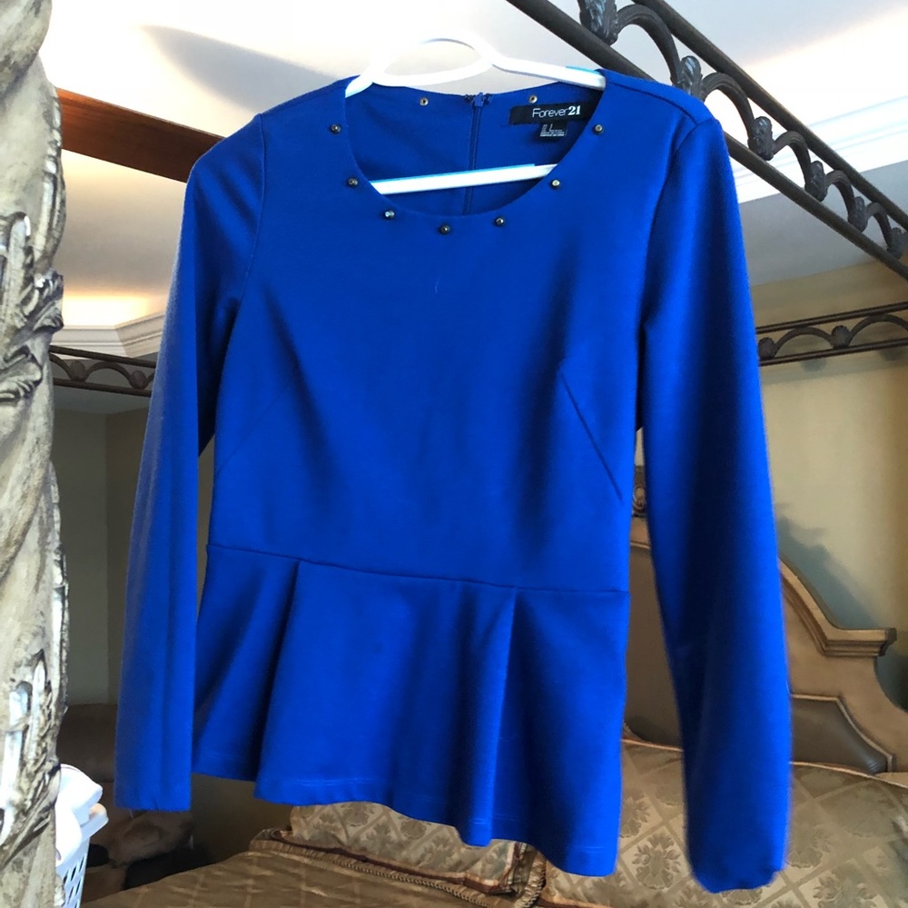 Bright blue long sleeve top