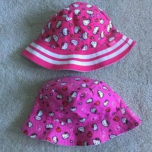 Two Hello Kitty sun hats for toddlers beach cover