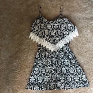 Black and white romper with lace detail