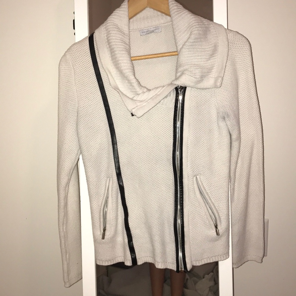 White zip up sweater with leather from
