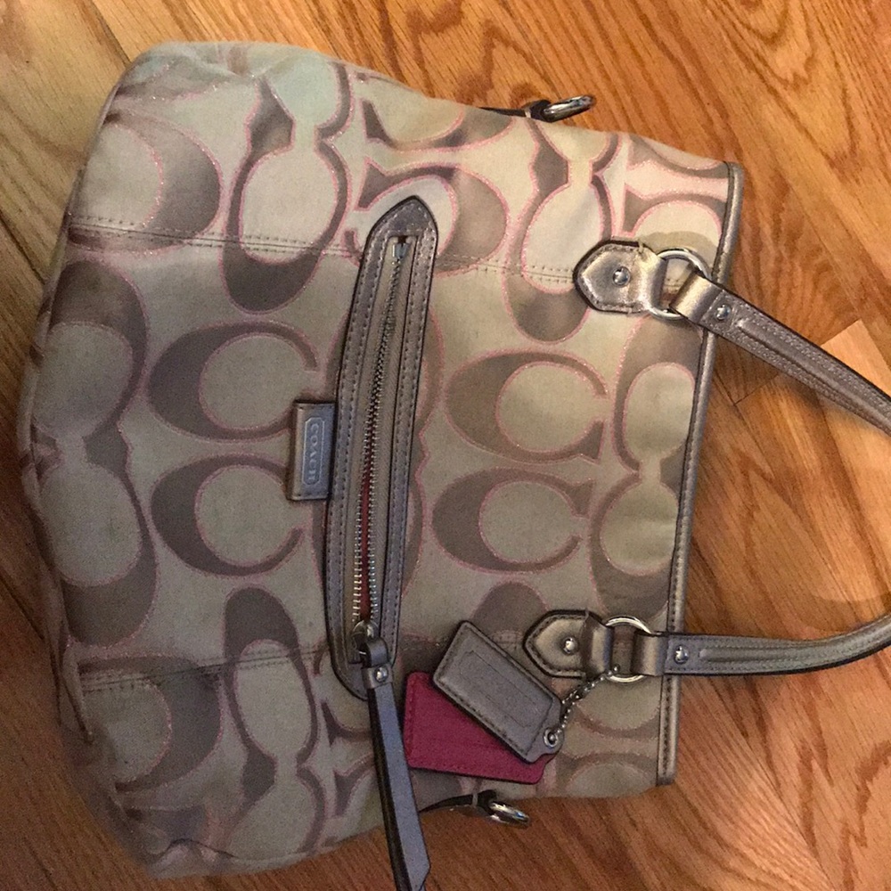 Barely used real coach gold and pink purse