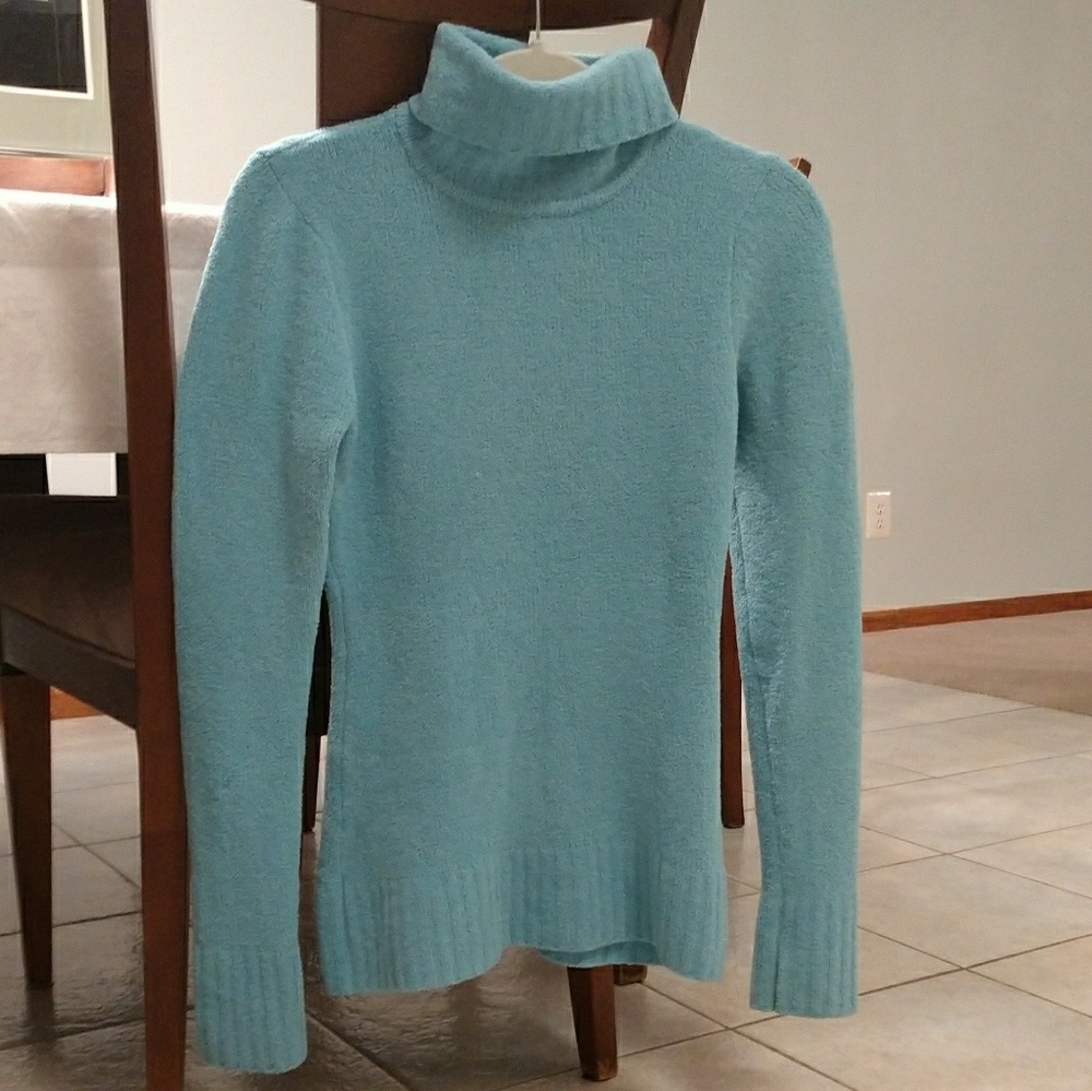 light blue turtleneck