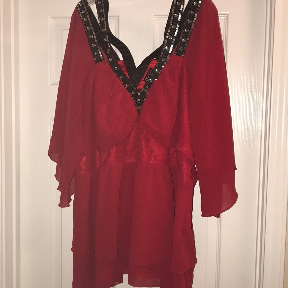 Red blouse with beads and sequined accents