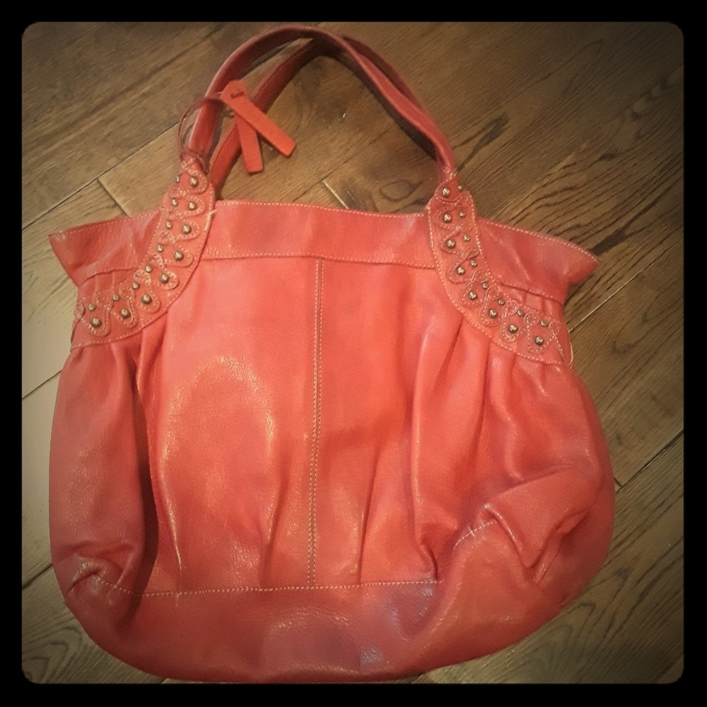 Red leather tote bag.