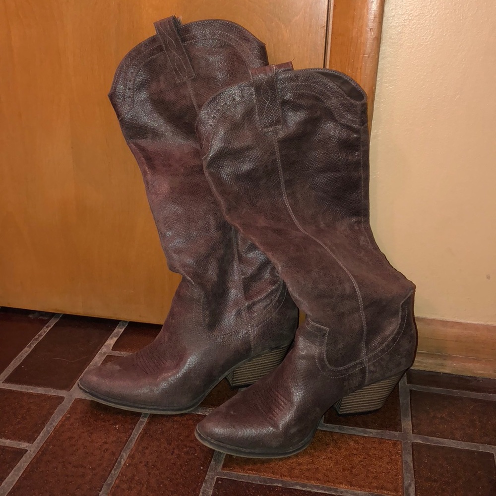 Brown cowboy boots.  MIA size 10.