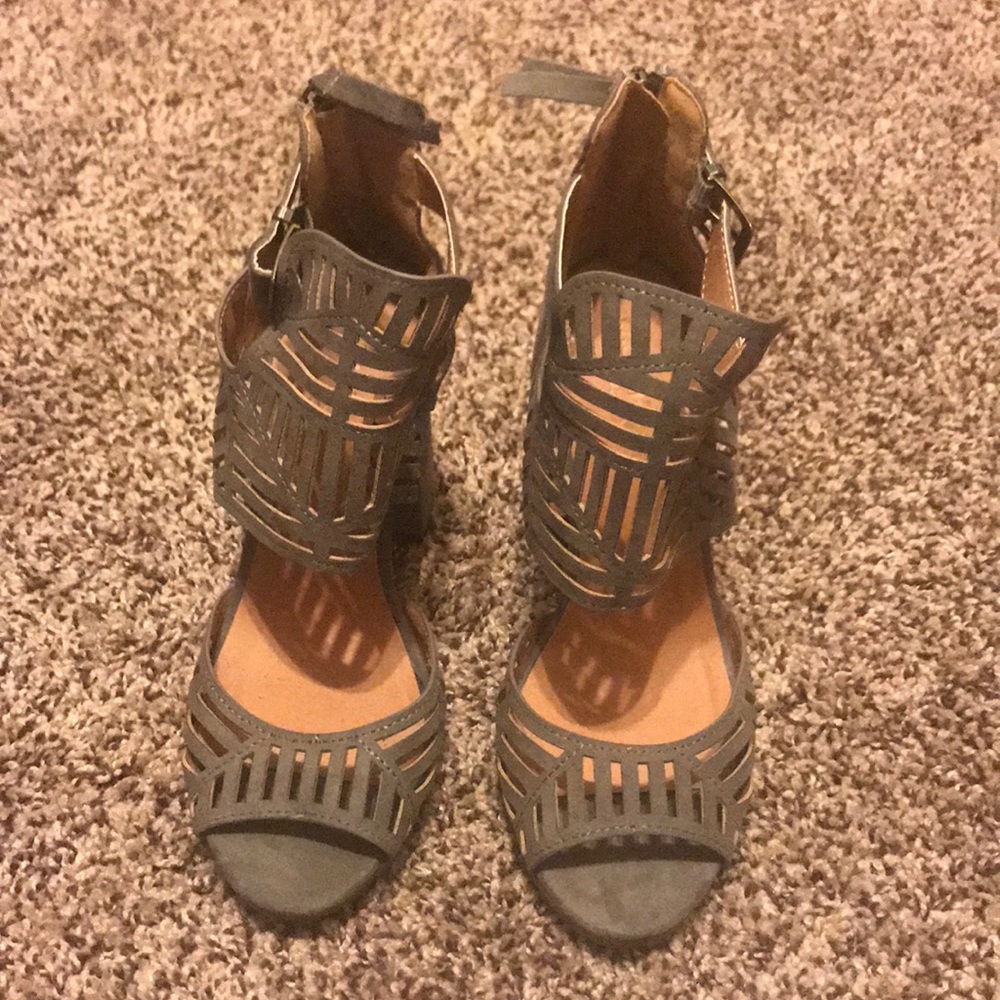 Never Worn. Tribal style chunky heels.