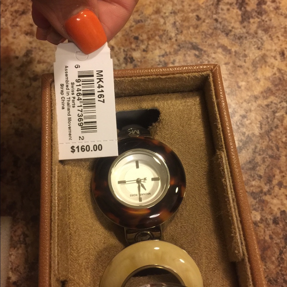 Woman’s watch with changeable faces.