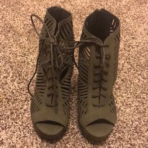 Green, Tall , tribal style heels.