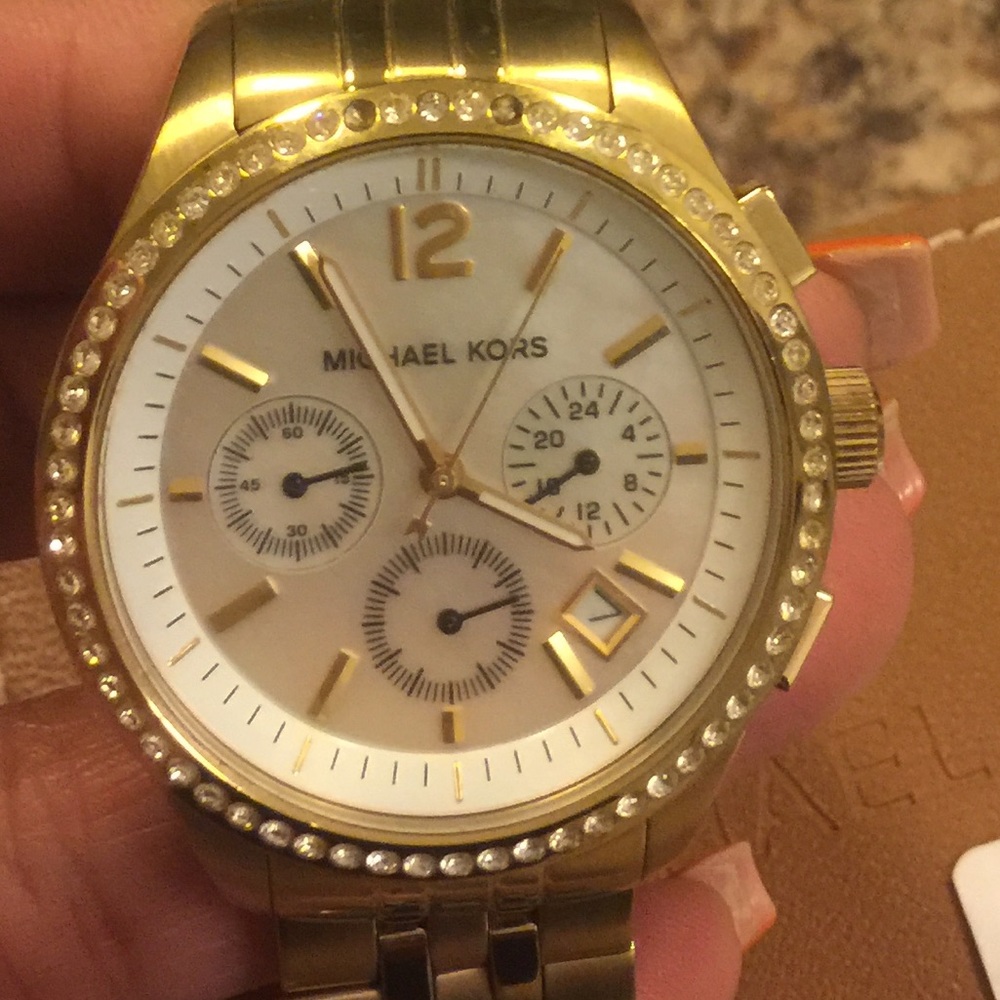 Woman’s gold watch