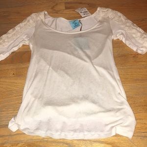 white top with lacey sleeves