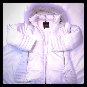 Authentic moncler down jacket with real fur.