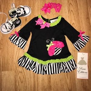 Baby girl size 6 Months dress by rare editions.