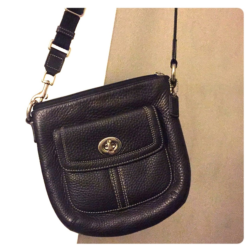 Black leather Coach crossbody purse.