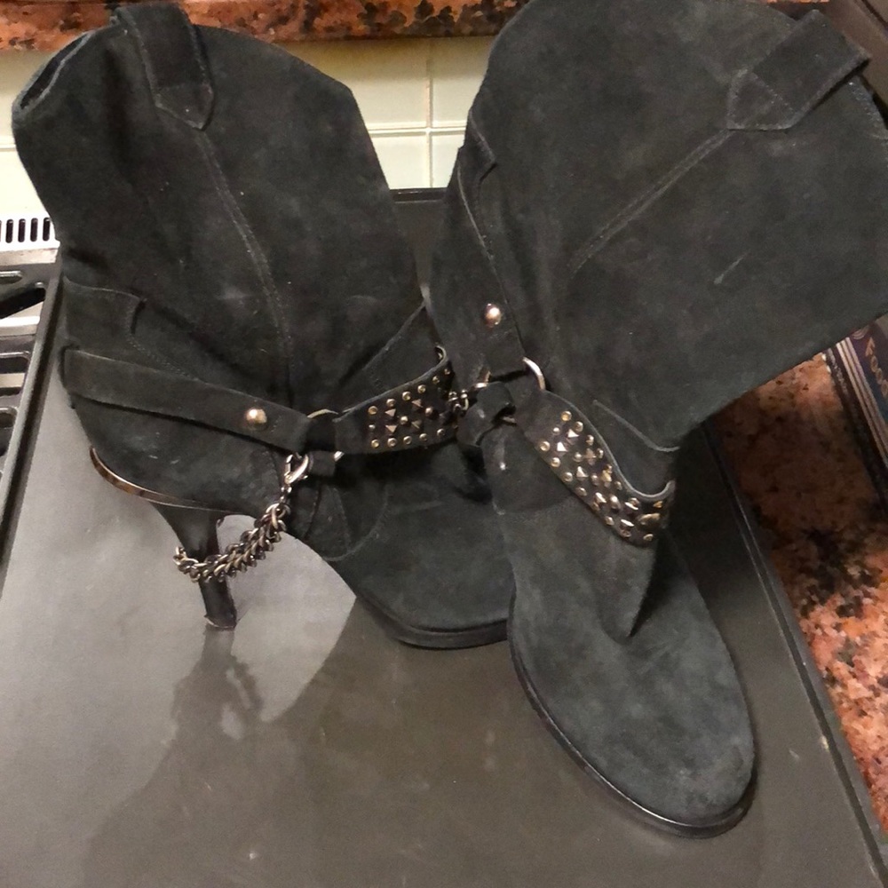 Black high heel booties with chain detail
