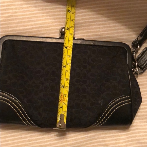 Coach black kiss lock wristlet. - Picture 2 of 6