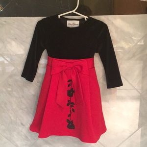 Girl’s velvet and satin dress.