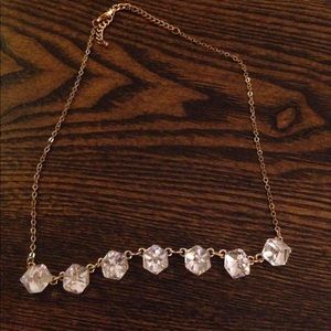 Gold necklace with square gems