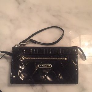 Coach patent leather wristlet wallet.