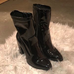 Black latex ankle boots