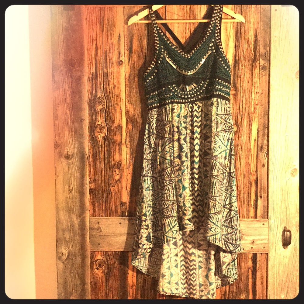 dress with metallic embellishments native print