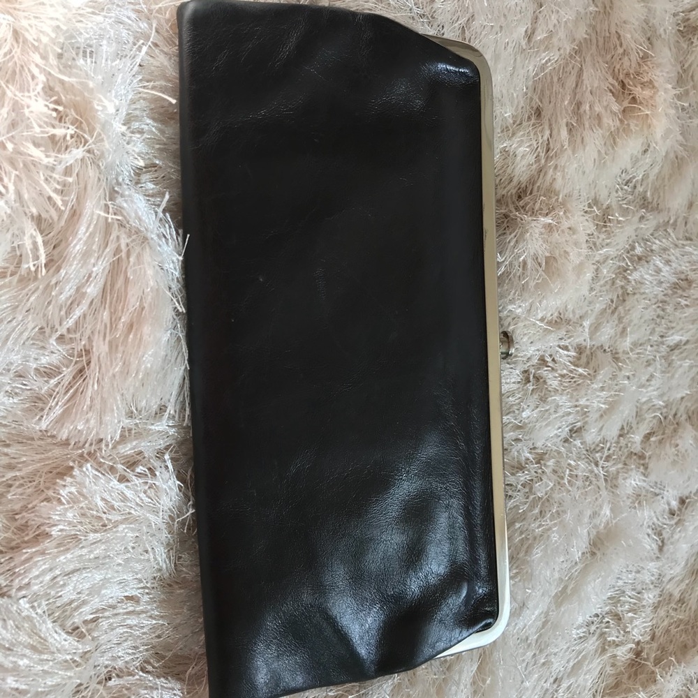 Leather versatile clutch.