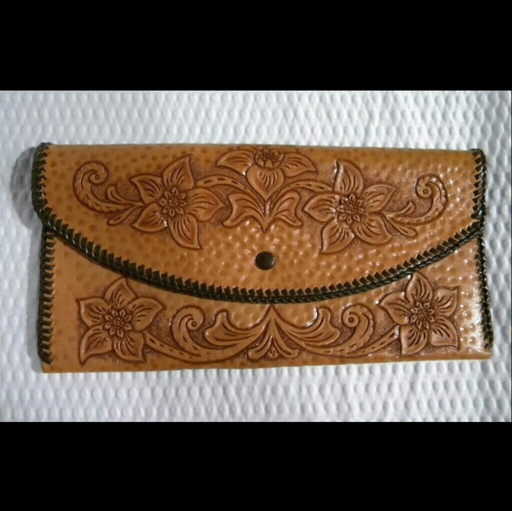 Tooled leather clutch
