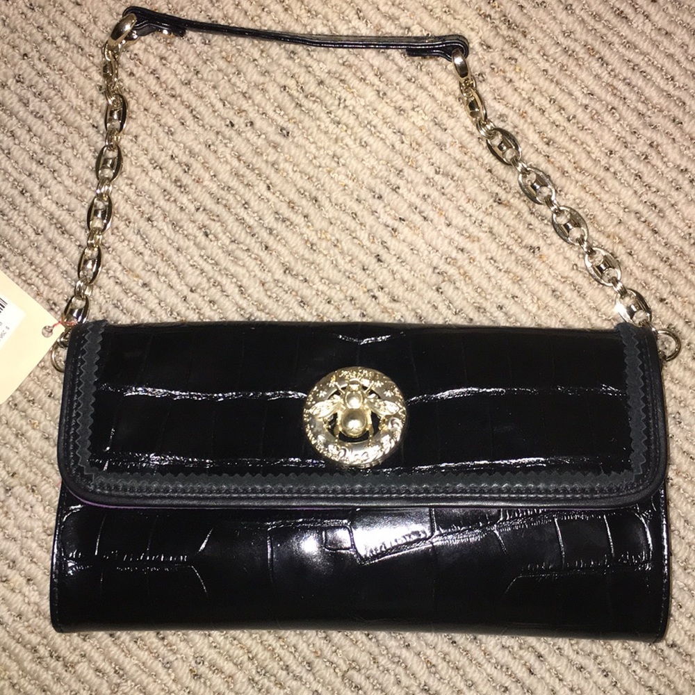 Abigail Riggs black clutch RIGG08 MSRP $298