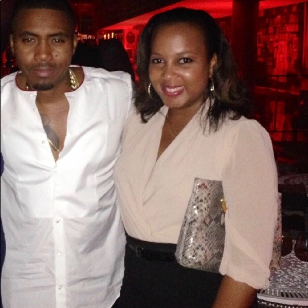 Michael Kors snakeskin clutch with gold hardware