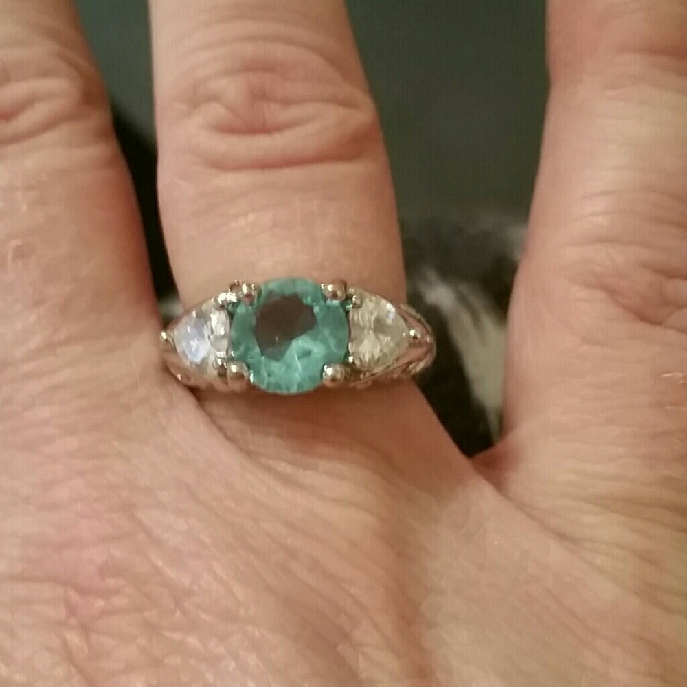 Solitaire floral ring
