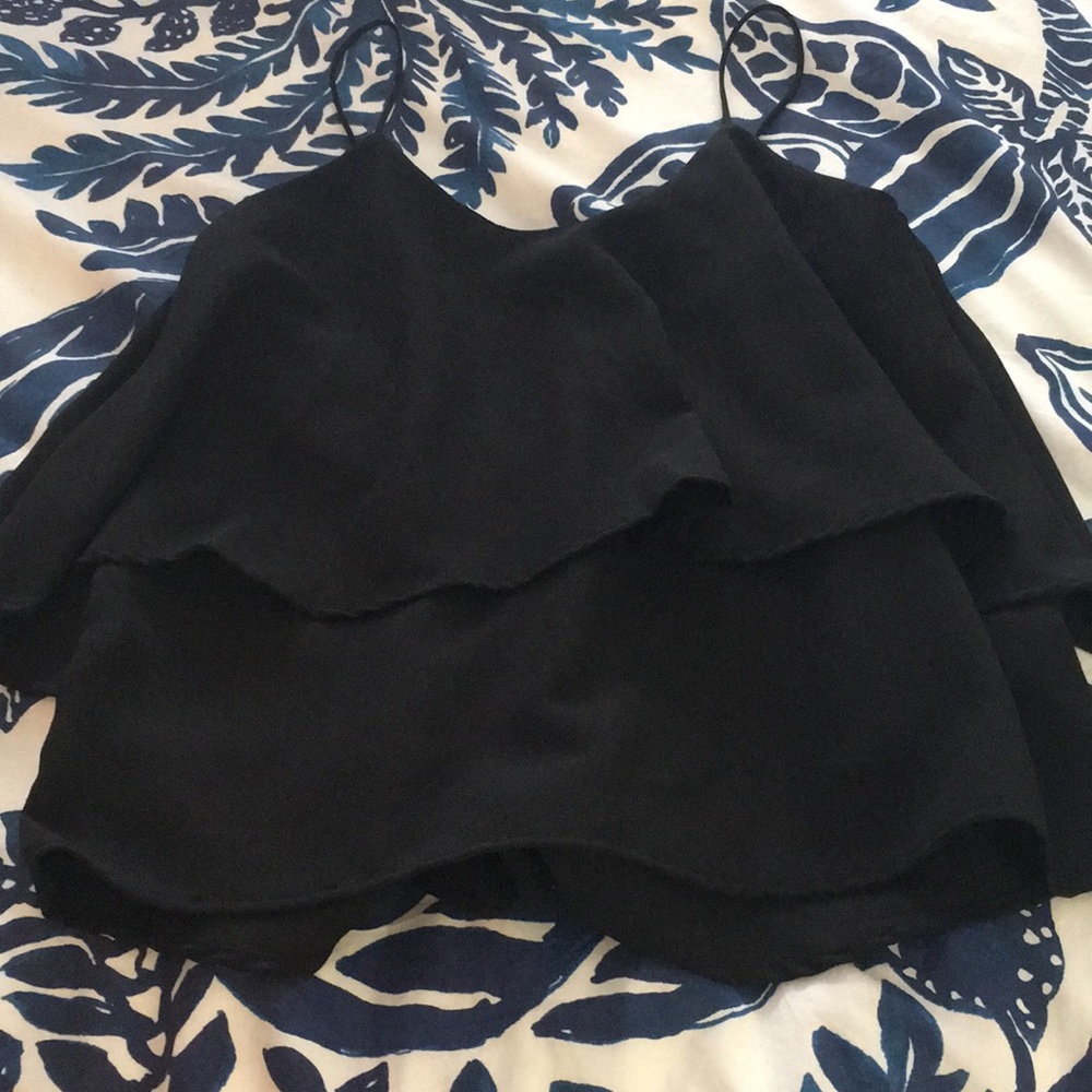 Black going out top