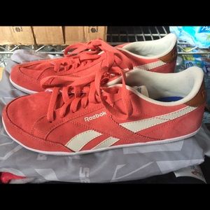 Peach colored Reebok shoes