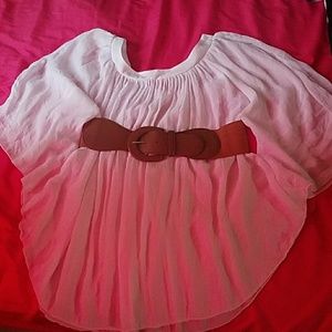 A white flowy blouse and belt