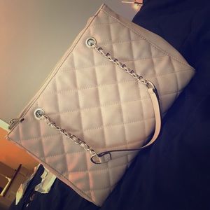A light pink handbag