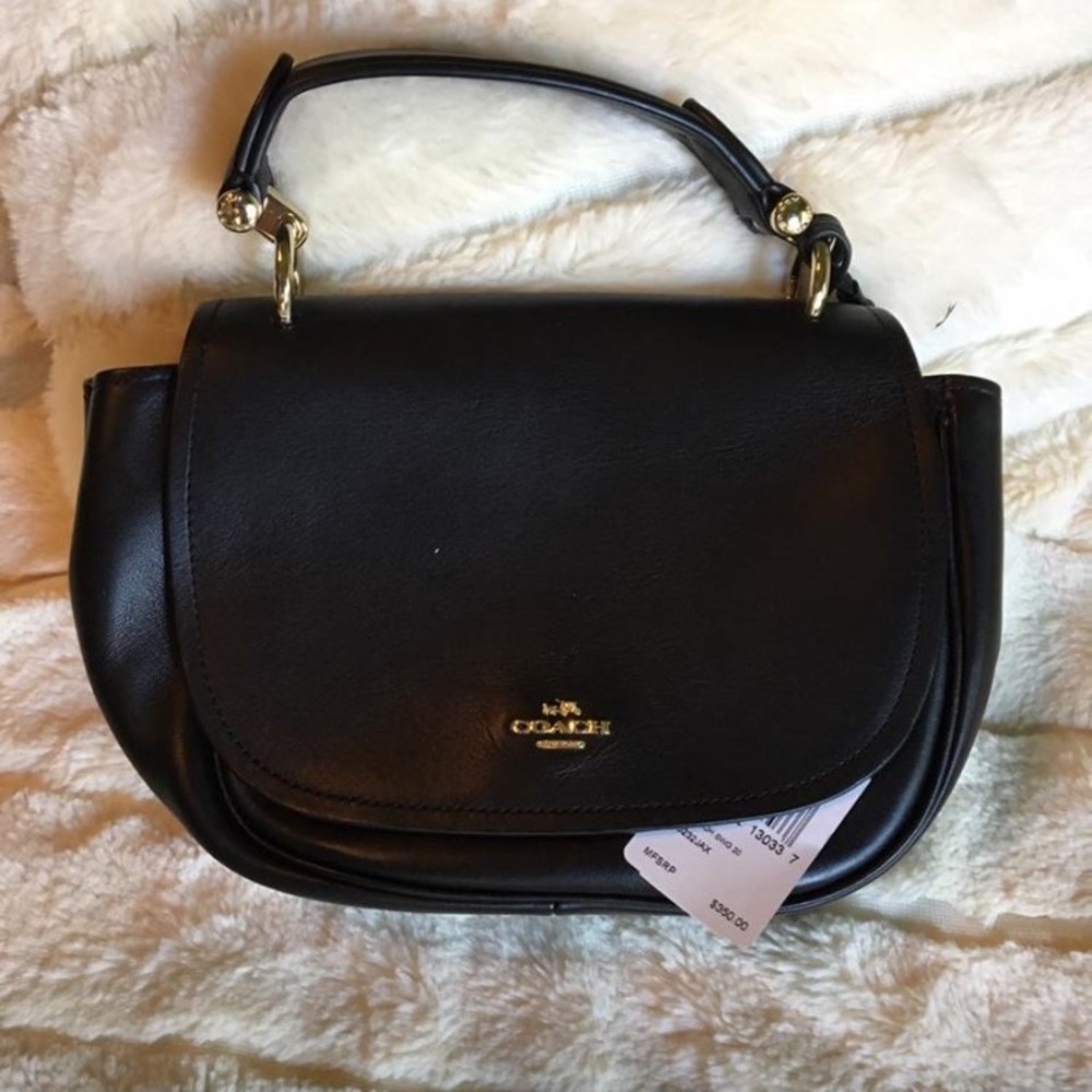 Stunning Black Coach soft leather mini purse.