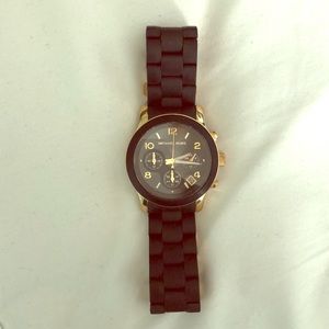 Black and gold Michael Kors watch