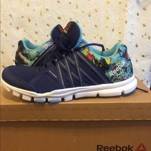 Brand New woman's Reeboks. Sz 7.5