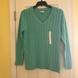 Medium sized, loose fitting v-neck Sweater