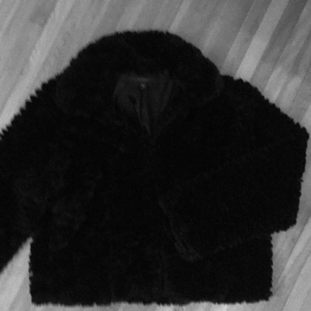 Black faux fur jacket with hidden closures