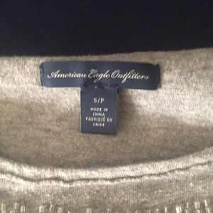 Grey tank top with beaded accent