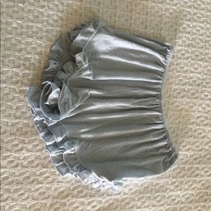 BRANDY MELVILLE. LIGHT BLUE RUFFLE SHORT.