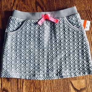 Sweater skirt with metallic accent tread
