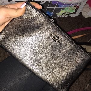 Coach gold and black leather crossbody bag
